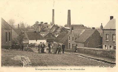 La grande rue de Wargnies-le-Grand sur une carte postale ancienne